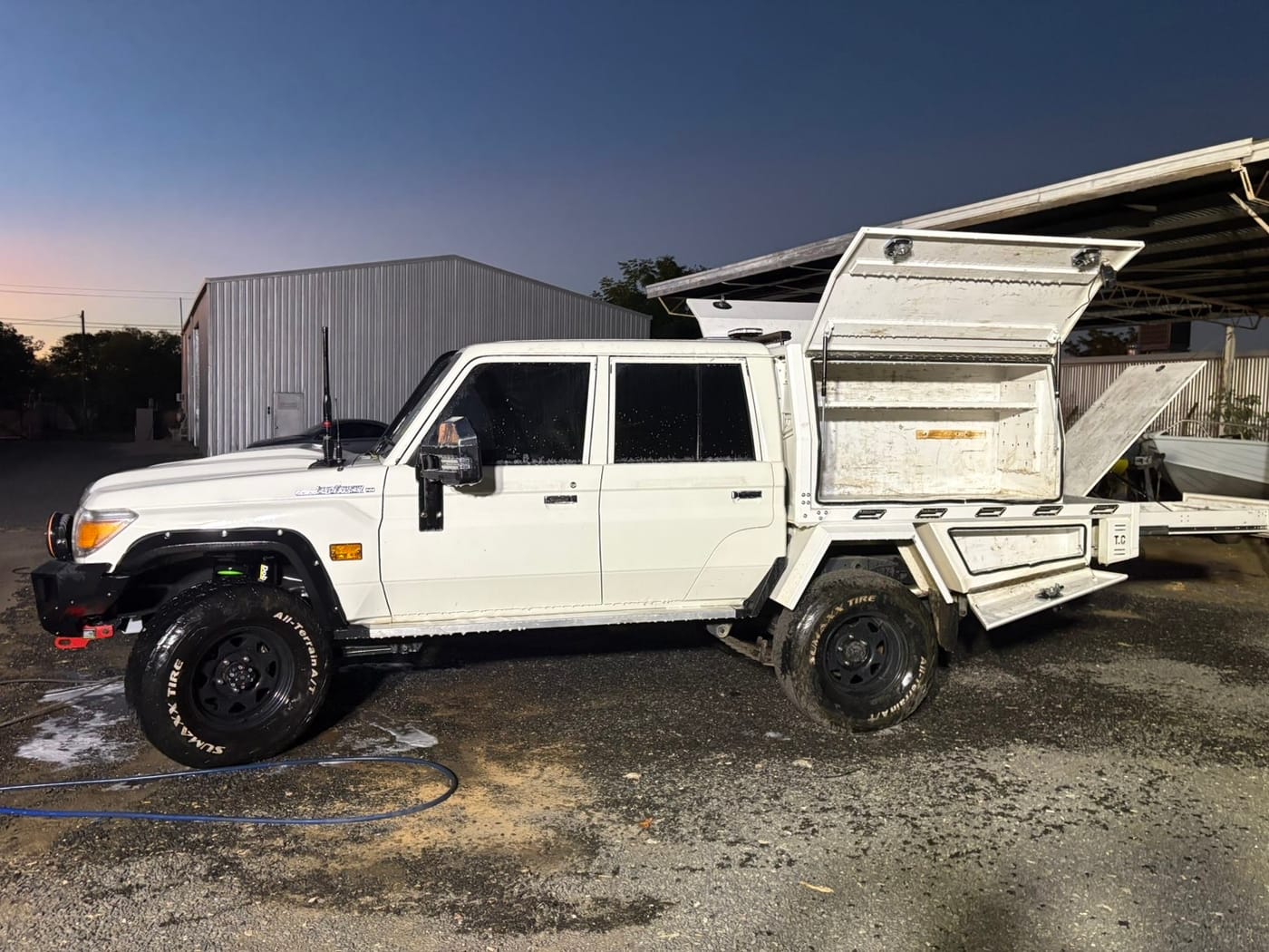 Service ute at dusk with canopy open